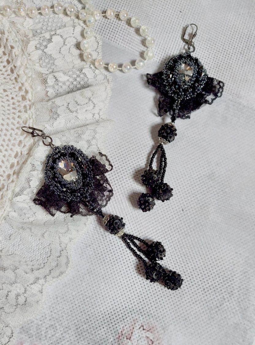 BO Evening wear embroidered with Swarovski crystals, a very old black lace, round beads woven with sequins and seed beads