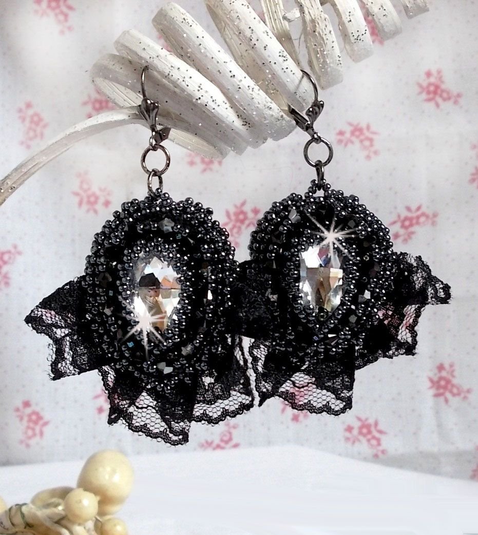 BO Evening wear embroidered with Swarovski crystals, a very old black lace, round beads woven with sequins and seed beads