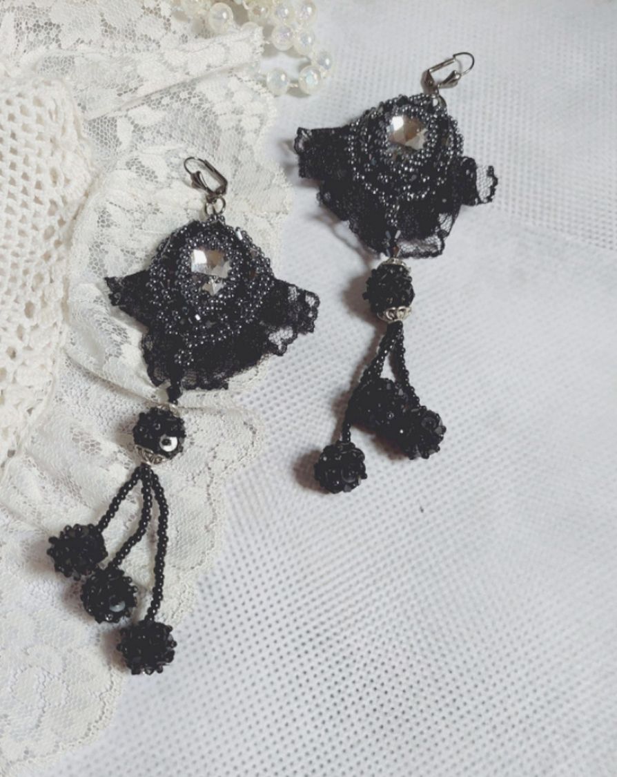 BO Evening wear embroidered with Swarovski crystals, a very old black lace, round beads woven with sequins and seed beads