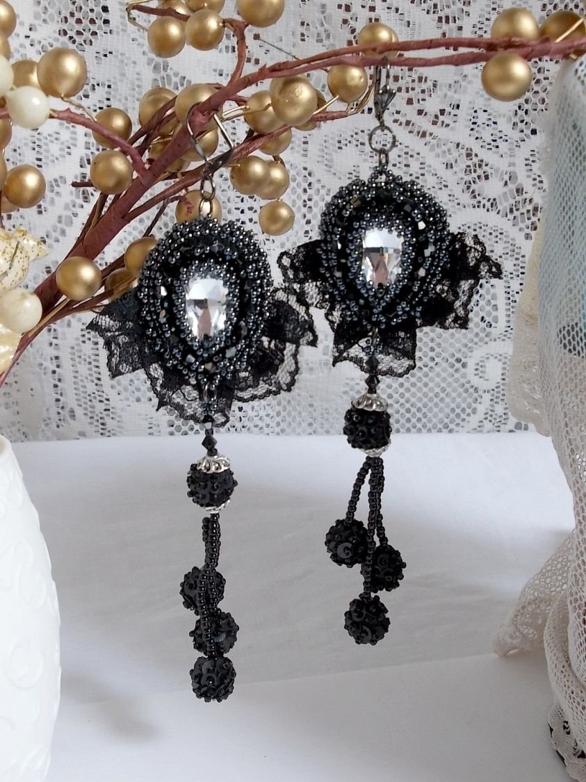 BO Evening wear embroidered with Swarovski crystals, a very old black lace, round beads woven with sequins and seed beads