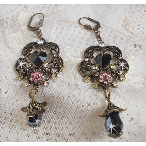 BO Irresistible Passion Collection mounted with Swarovski crystals on bronze filigree flower candle holders