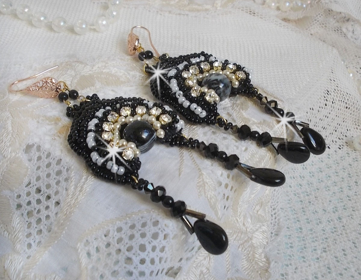 BO Féerie Black are embroidered with Swarovski crystals, crystal chatons, round faceted flattened beads, twisted Bugles and seed beads