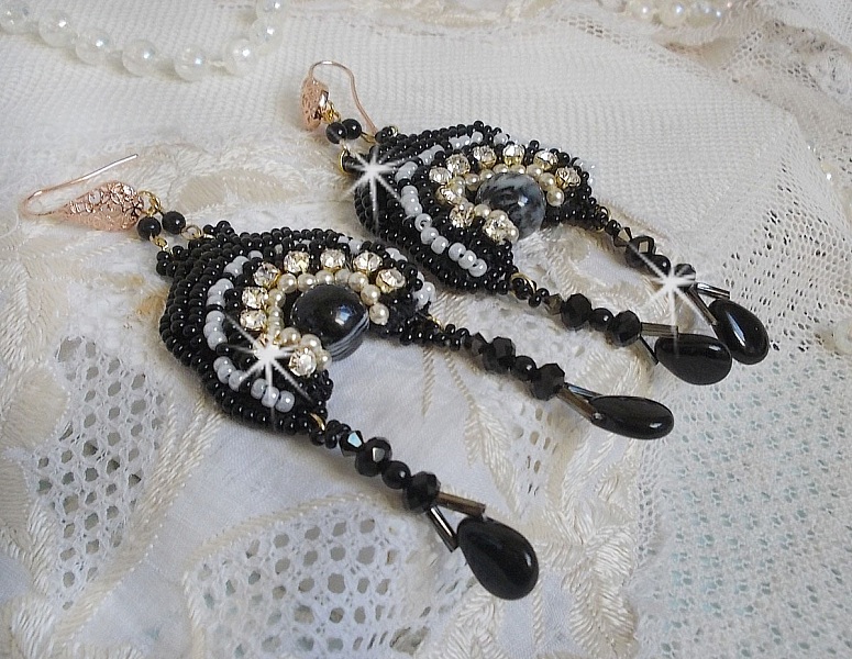 BO F&eacute;erie Black are embroidered with Swarovski crystals, crystal chatons, round faceted flattened beads, twisted Bugles and seed beads