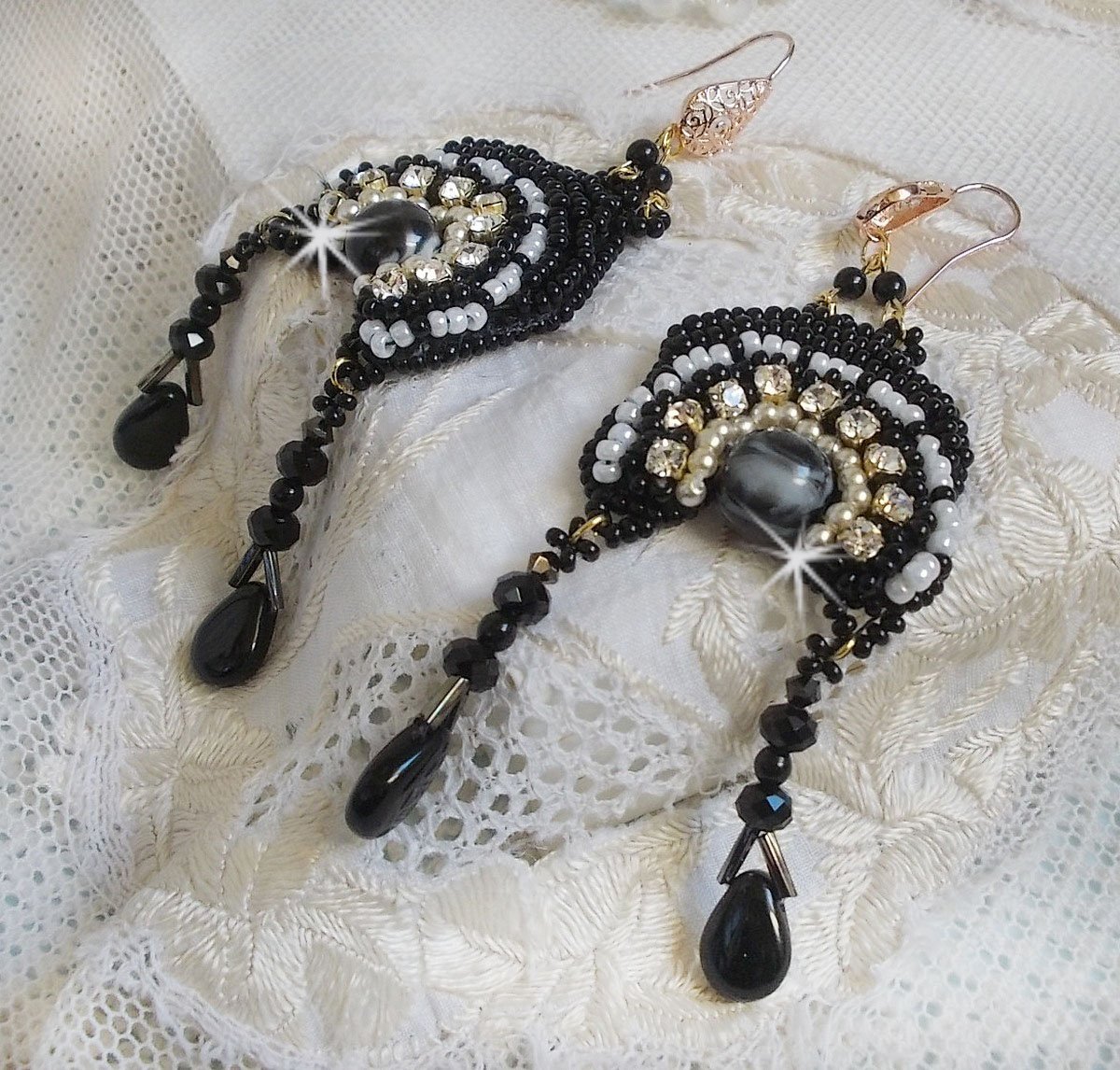 BO Féerie Black are embroidered with Swarovski crystals, crystal chatons, round faceted flattened beads, twisted Bugles and seed beads