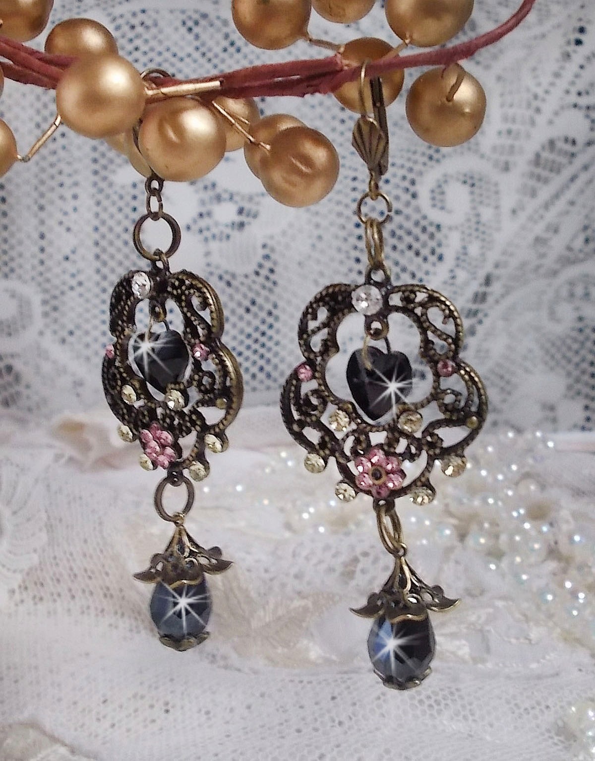 BO Irresistible Passion Collection mounted with Swarovski crystals on bronze filigree flower candle holders