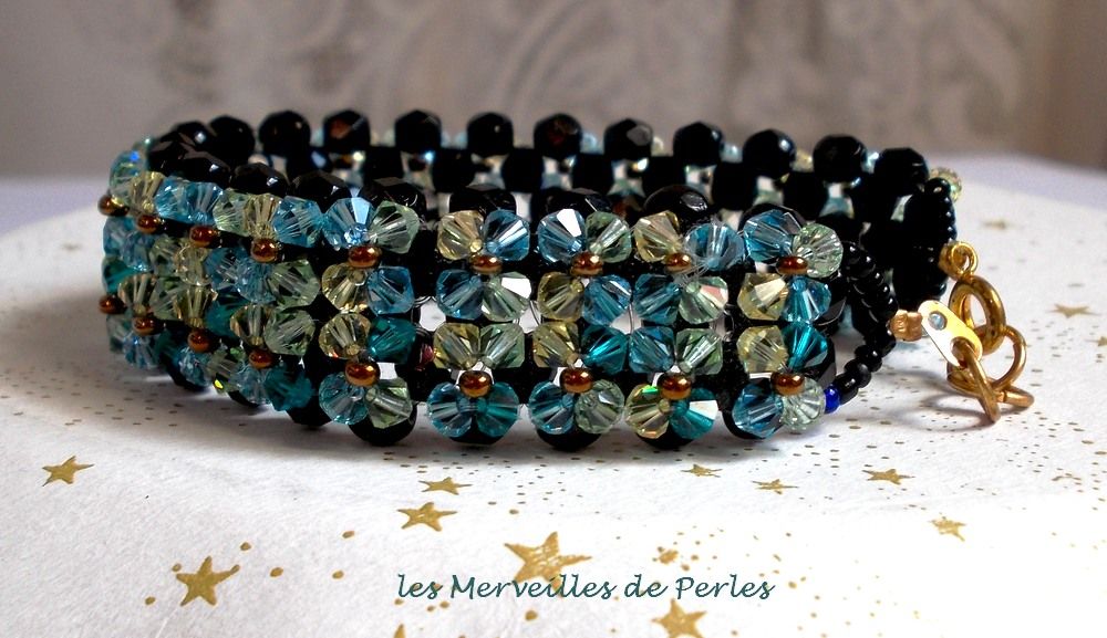 Sparkling Aurora bracelet with black facets and colored spinning tops in Swarovski crystal