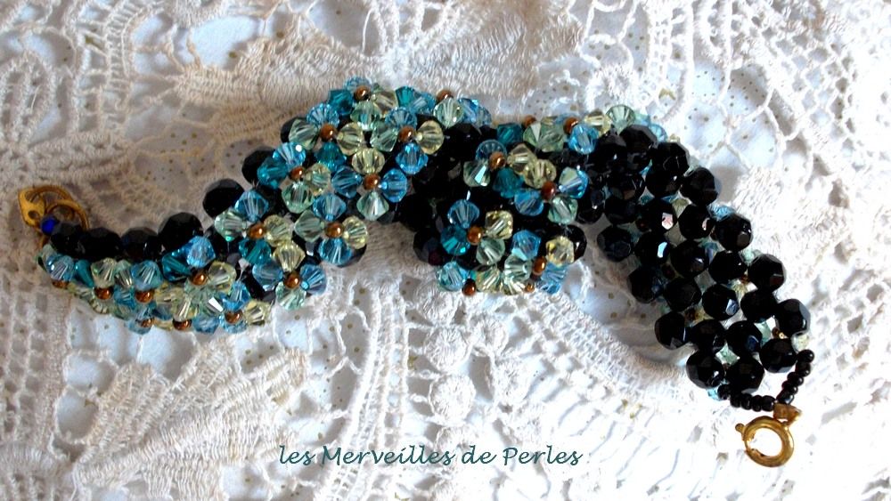 Sparkling Aurora bracelet with black facets and colored spinning tops in Swarovski crystal