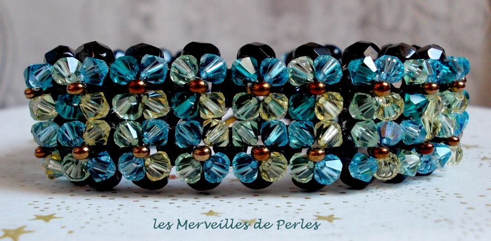 Sparkling Aurora bracelet with black facets and colored spinning tops in Swarovski crystal