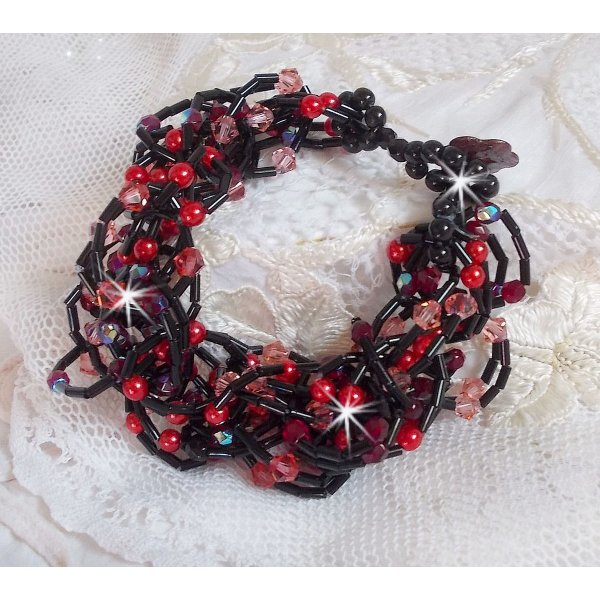 Feeling bracelet with tube seed beads, mother of pearl beads and Swarovski crystal spinners