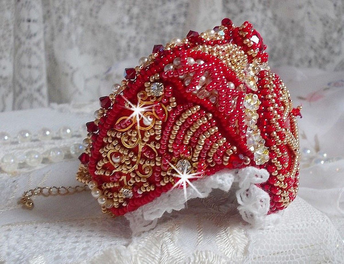 Bracelet Nous Two Haute-Couture cuff embroidered with Swarovski crystals, an oval red glass cabochon and seed beads