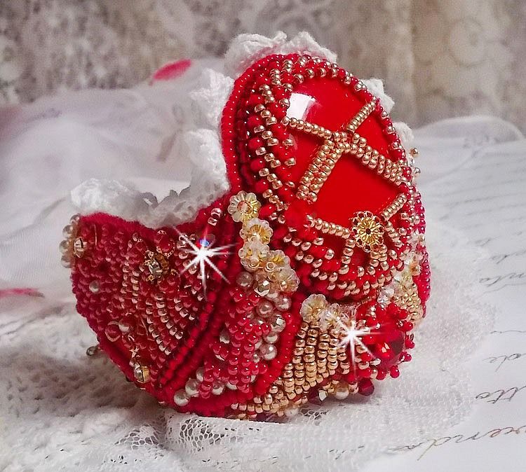 Bracelet Nous Two Haute-Couture cuff embroidered with Swarovski crystals, an oval red glass cabochon and seed beads