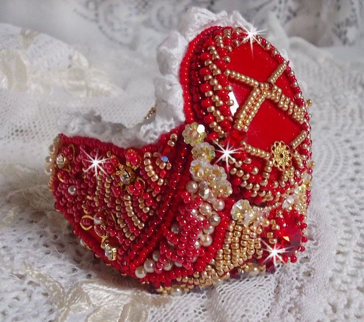 Bracelet Nous Two Haute-Couture cuff embroidered with Swarovski crystals, an oval red glass cabochon and seed beads