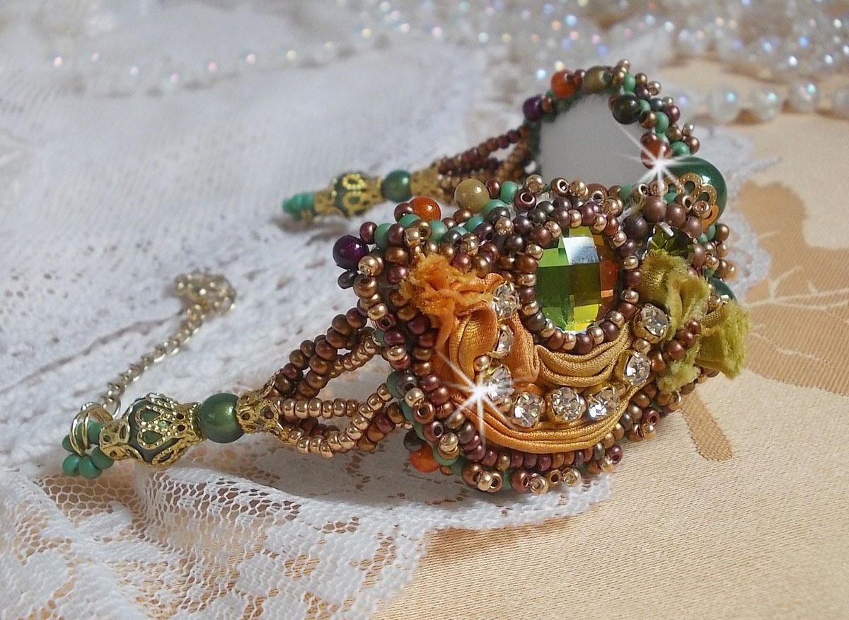 Venetian moon bracelet embroidered with silk ribbon, faceted cabochons, Swarovski crystals and magic beads