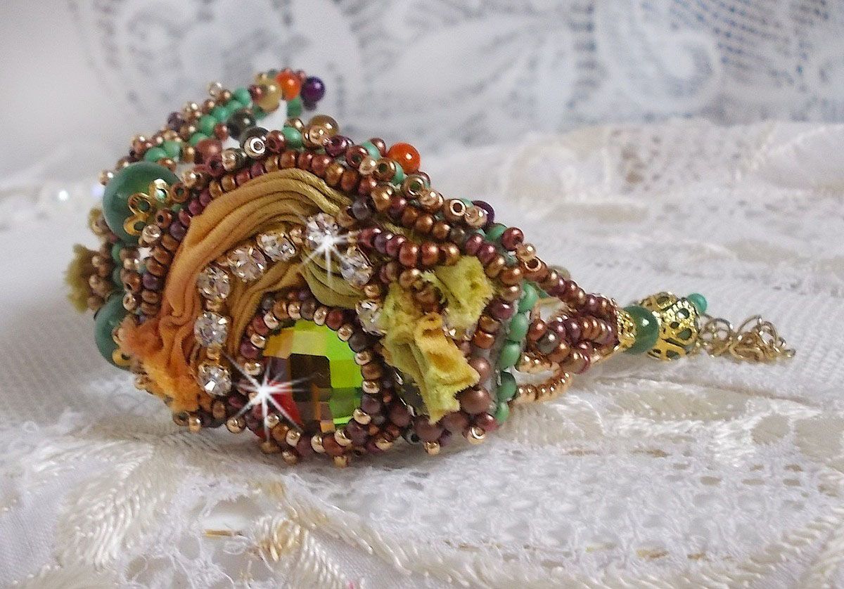 Venetian moon bracelet embroidered with silk ribbon, faceted cabochons, Swarovski crystals and magic beads