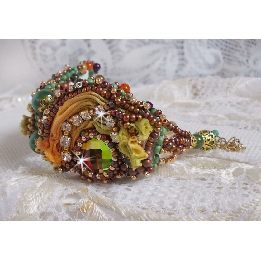 Venetian moon bracelet embroidered with silk ribbon, faceted cabochons, Swarovski crystals and magic beads