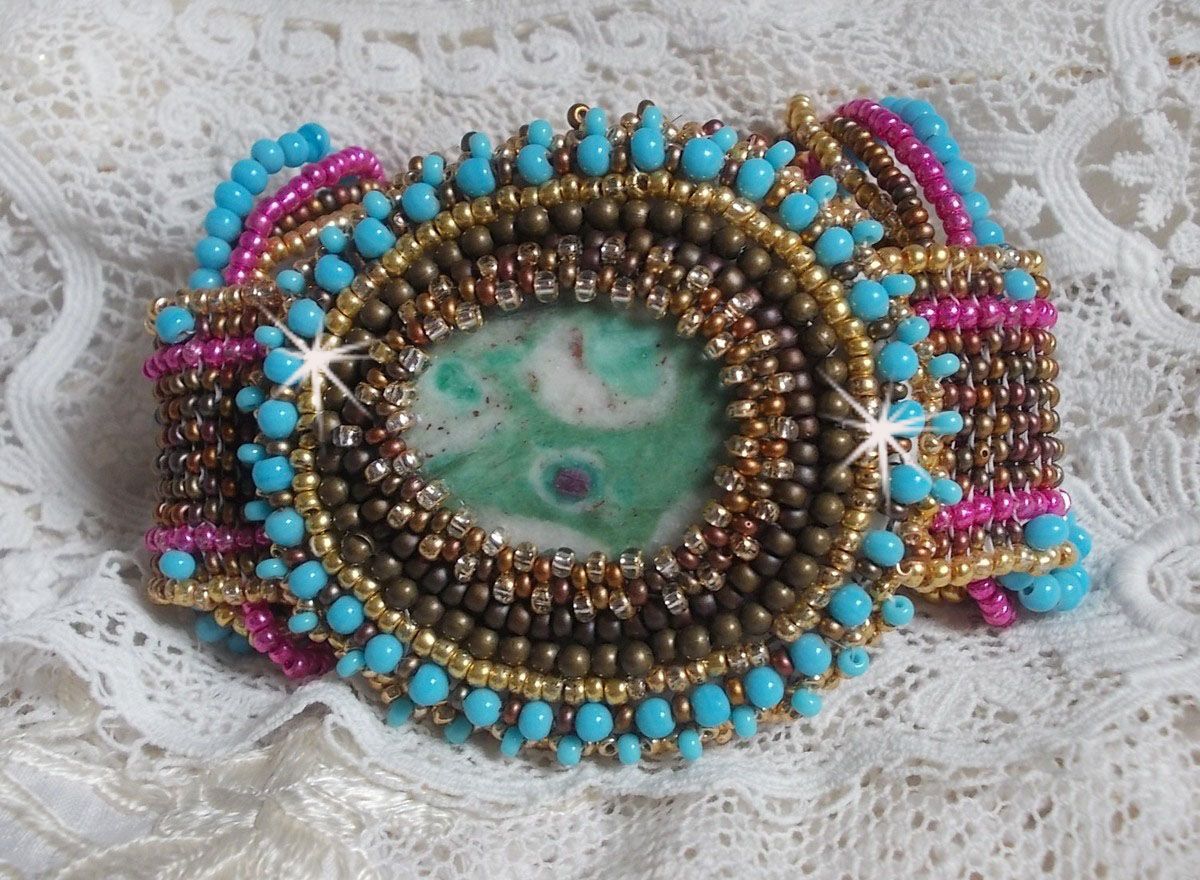 Cheyenne cuff bracelet embroidered with a gemstone, a Fuchsite ruby with Miyuki seed beads and Czech seed beads.