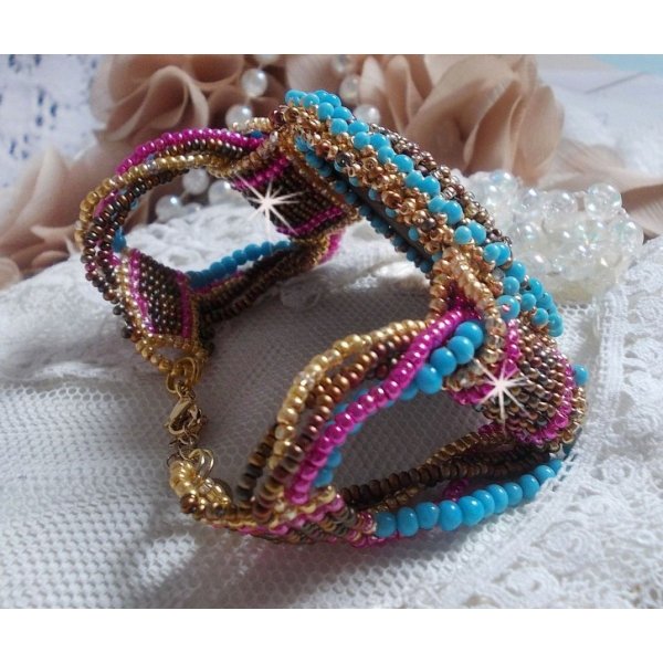 Cheyenne cuff bracelet embroidered with a gemstone, a Fuchsite ruby with Miyuki seed beads and Czech seed beads.