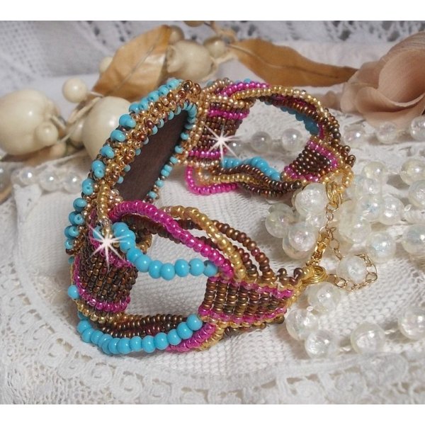 Cheyenne cuff bracelet embroidered with a gemstone, a Fuchsite ruby with Miyuki seed beads and Czech seed beads.