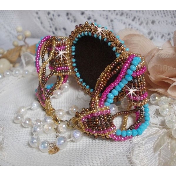 Cheyenne cuff bracelet embroidered with a gemstone, a Fuchsite ruby with Miyuki seed beads and Czech seed beads.