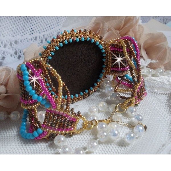Cheyenne cuff bracelet embroidered with a gemstone, a Fuchsite ruby with Miyuki seed beads and Czech seed beads.