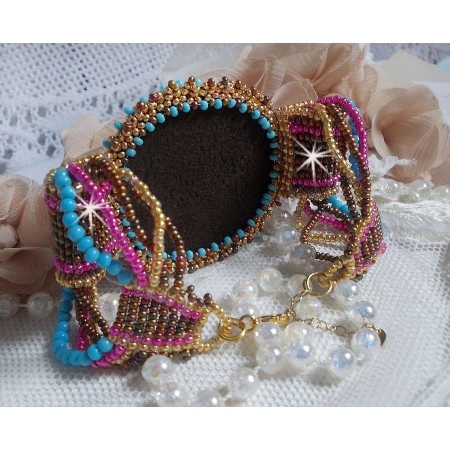 Cheyenne cuff bracelet embroidered with a gemstone, a Fuchsite ruby with Miyuki seed beads and Czech seed beads.