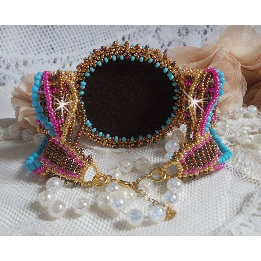 Cheyenne cuff bracelet embroidered with a gemstone, a Fuchsite ruby with Miyuki seed beads and Czech seed beads.