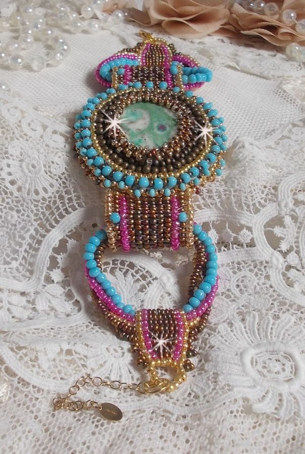 Cheyenne cuff bracelet embroidered with a gemstone, a Fuchsite ruby with Miyuki seed beads and Czech seed beads.