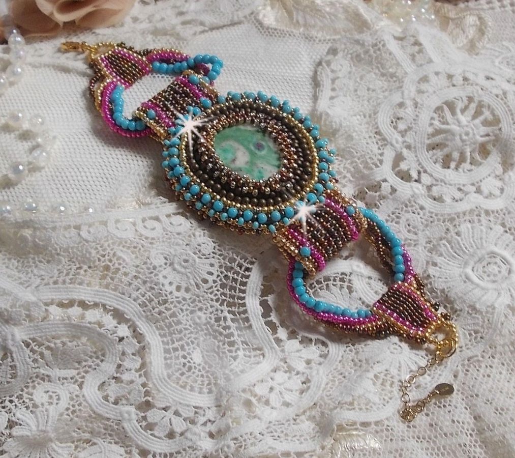 Cheyenne cuff bracelet embroidered with a gemstone, a Fuchsite ruby with Miyuki seed beads and Czech seed beads.