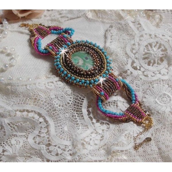 Cheyenne cuff bracelet embroidered with a gemstone, a Fuchsite ruby with Miyuki seed beads and Czech seed beads.