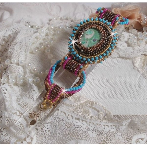 Cheyenne cuff bracelet embroidered with a gemstone, a Fuchsite ruby with Miyuki seed beads and Czech seed beads.