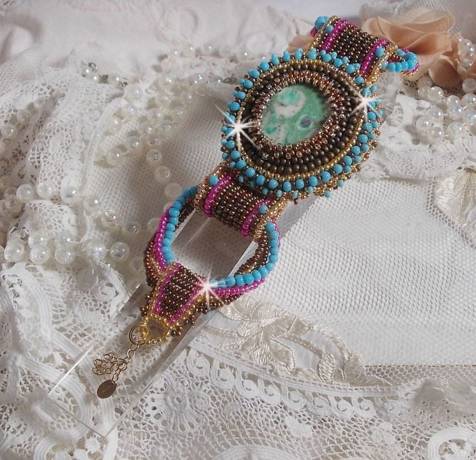 Cheyenne cuff bracelet embroidered with a gemstone, a Fuchsite ruby with Miyuki seed beads and Czech seed beads.