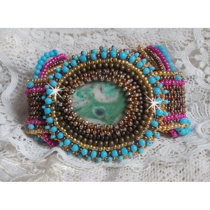 Cheyenne cuff bracelet embroidered with a gemstone, a Fuchsite ruby with Miyuki seed beads and Czech seed beads.