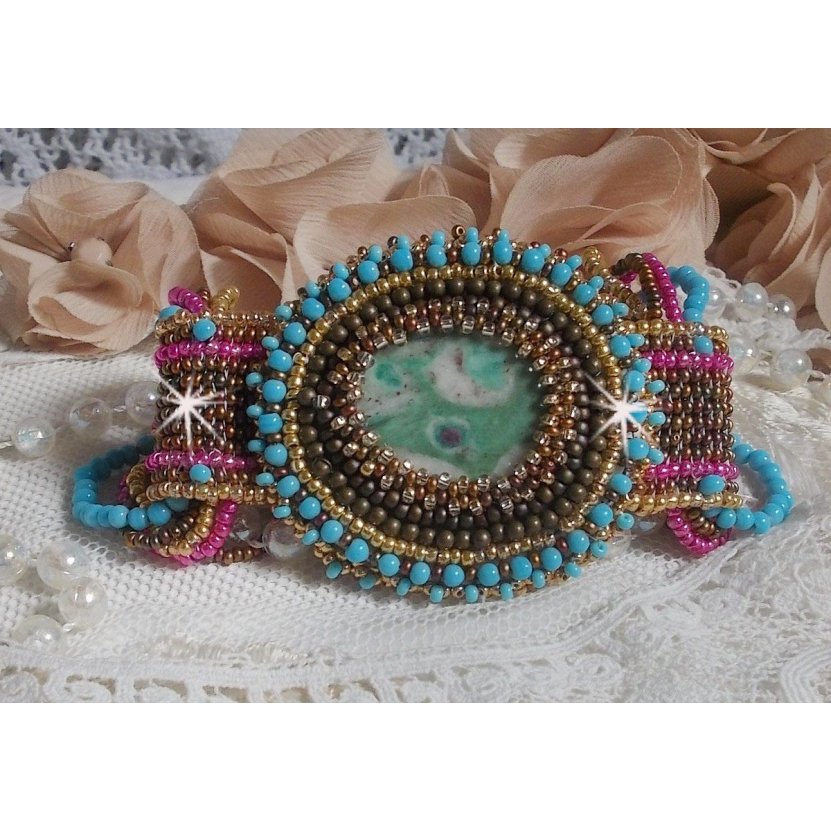 Cheyenne cuff bracelet embroidered with a gemstone, a Fuchsite ruby with Miyuki seed beads and Czech seed beads.