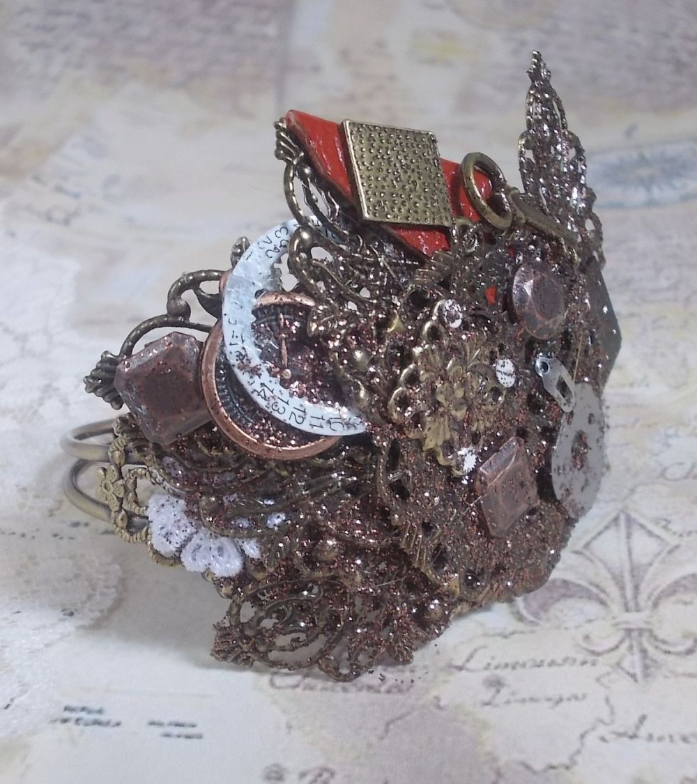 Navigating Shadow bracelet created with Cognac leather, fabric flower, accessories in Bronze, Copper, Black with charms