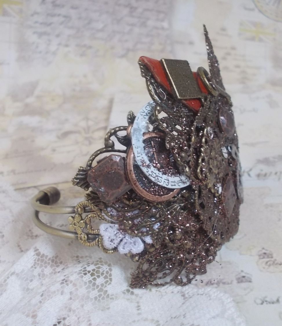 Navigating Shadow bracelet created with Cognac leather, fabric flower, accessories in Bronze, Copper, Black with charms