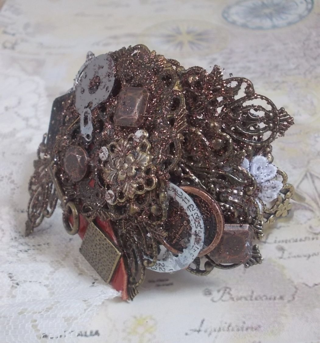 Navigating Shadow bracelet created with Cognac leather, fabric flower, accessories in Bronze, Copper, Black with charms