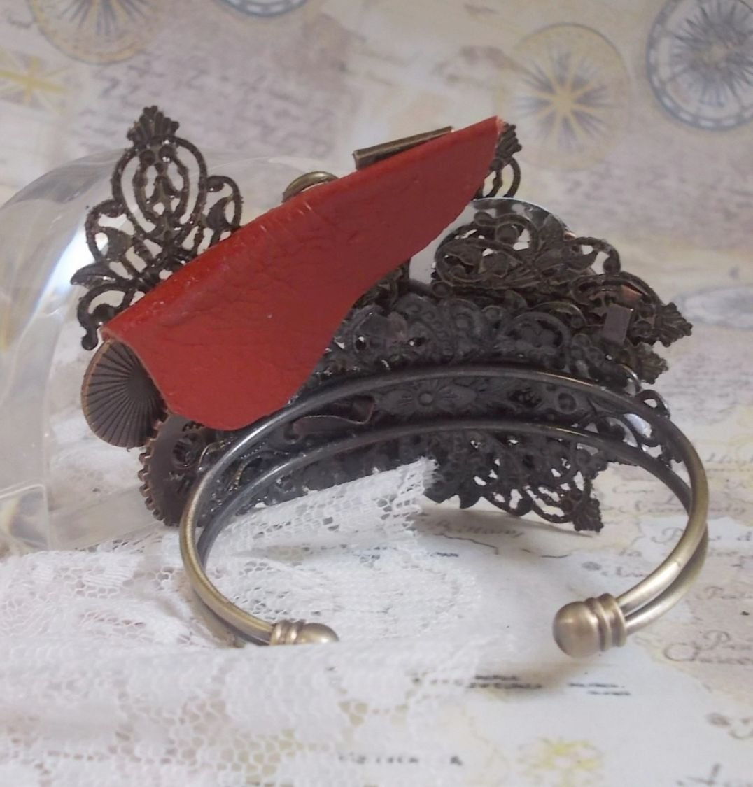 Navigating Shadow bracelet created with Cognac leather, fabric flower, accessories in Bronze, Copper, Black with charms