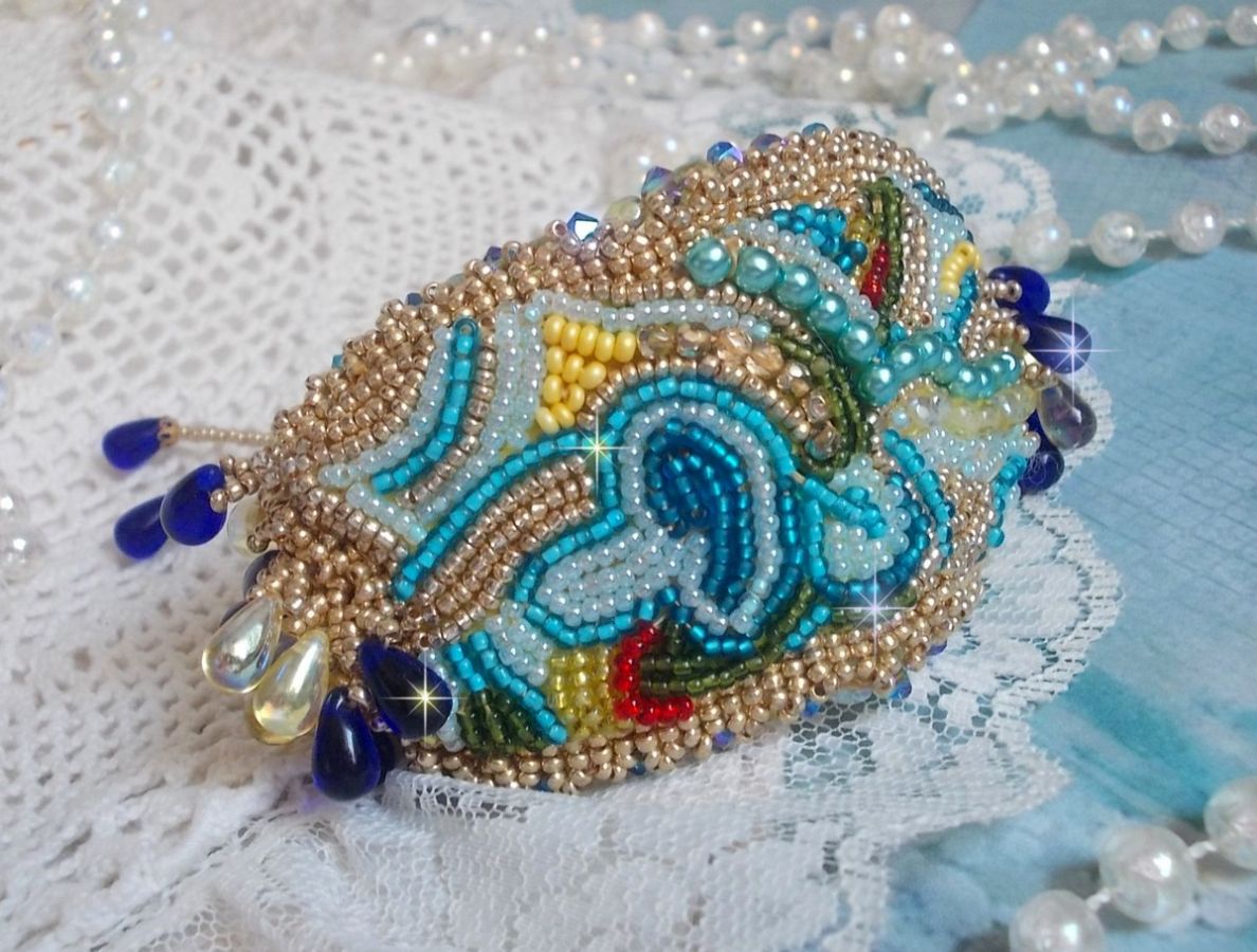 Blue Gold Butterfly bracelet embroidered with Swarovski crystals; smooth drops, facets, seed beads and a 14K Gold Filled clasp