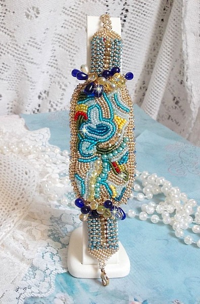 Blue Gold Butterfly bracelet embroidered with Swarovski crystals; smooth drops, facets, seed beads and a 14K Gold Filled clasp