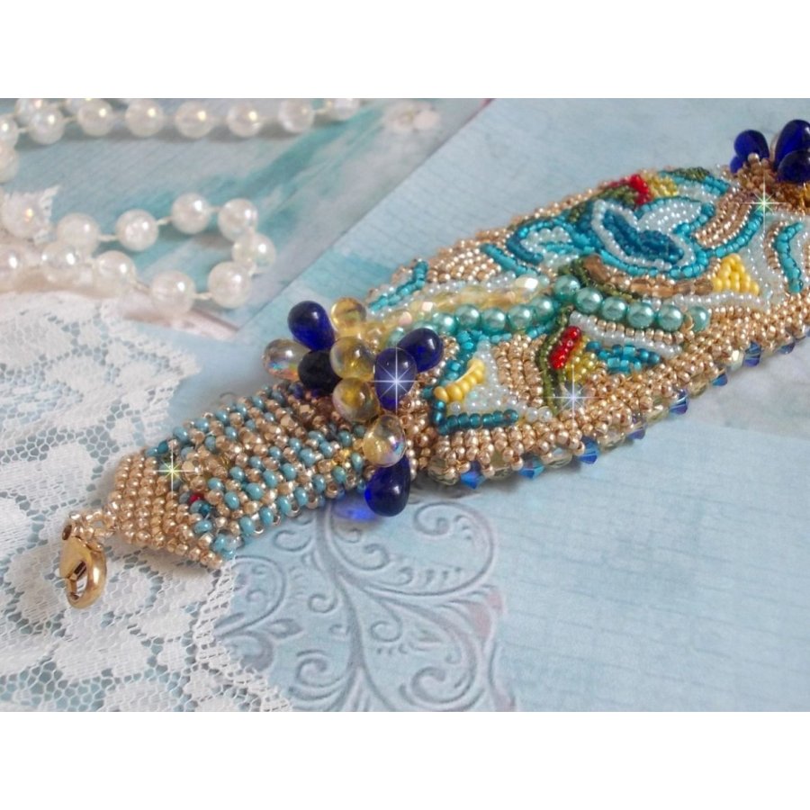 Blue Gold Butterfly bracelet embroidered with Swarovski crystals; smooth drops, facets, seed beads and a 14K Gold Filled clasp