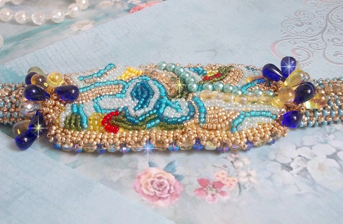 Blue Gold Butterfly bracelet embroidered with Swarovski crystals; smooth drops, facets, seed beads and a 14K Gold Filled clasp