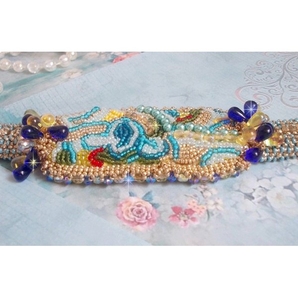 Blue Gold Butterfly bracelet embroidered with Swarovski crystals; smooth drops, facets, seed beads and a 14K Gold Filled clasp