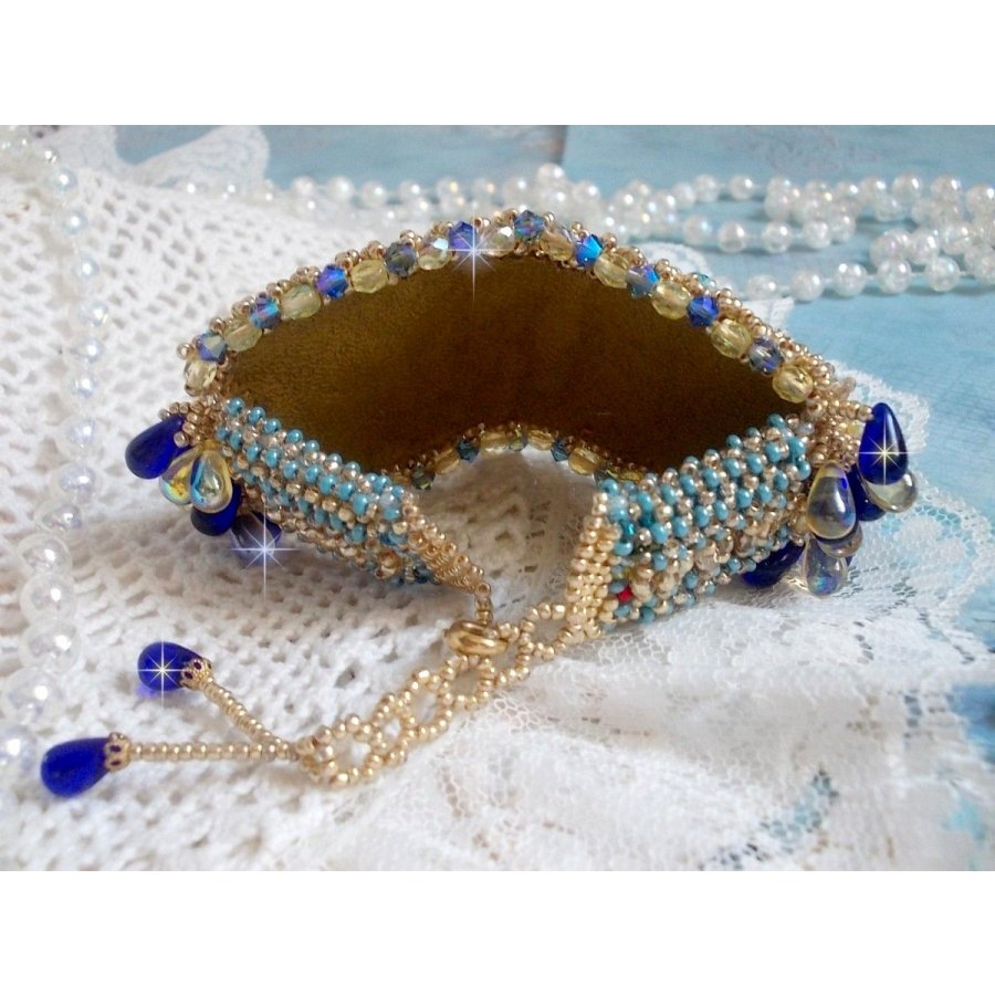 Blue Gold Butterfly bracelet embroidered with Swarovski crystals; smooth drops, facets, seed beads and a 14K Gold Filled clasp