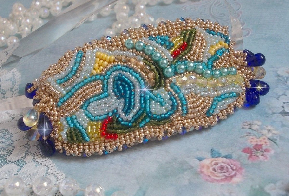 Blue Gold Butterfly bracelet embroidered with Swarovski crystals; smooth drops, facets, seed beads and a 14K Gold Filled clasp