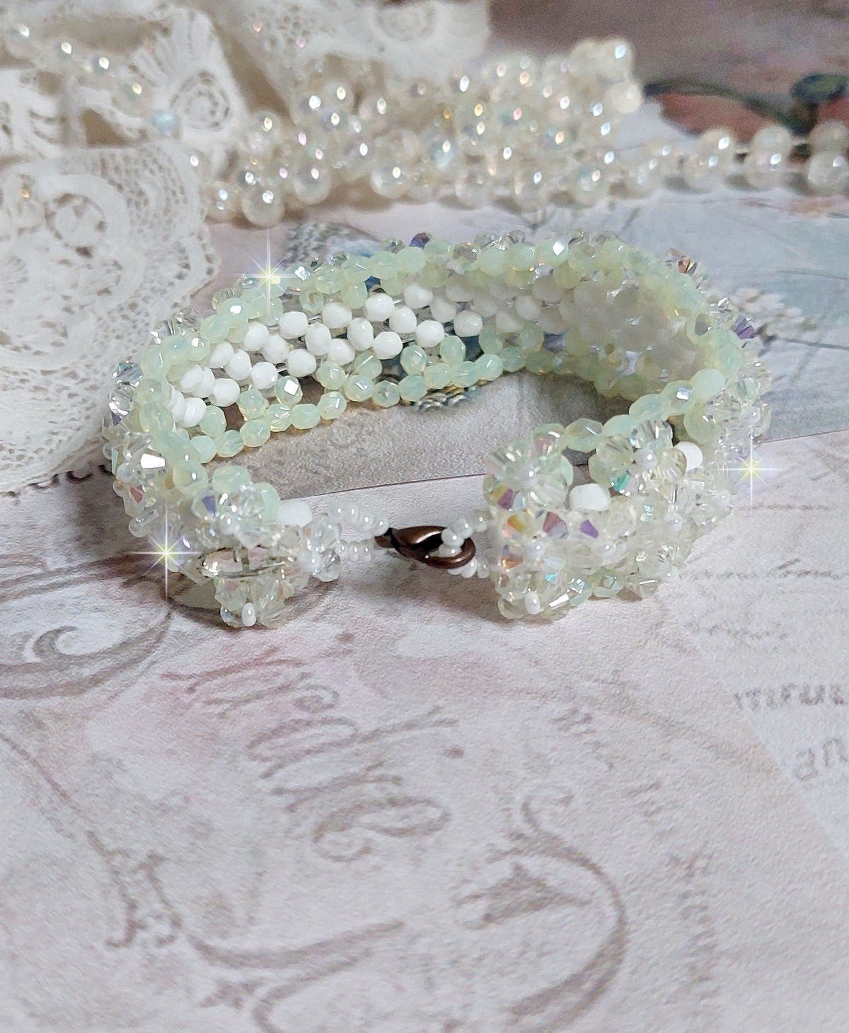 Venus bracelet with Swarovski crystal spinners and opaque white bohemian glass facets