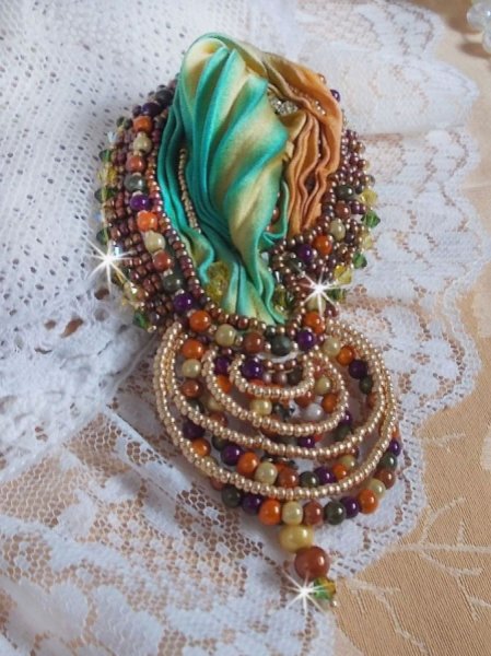 Venetian moon brooch embroidered with silk ribbon, magic beads and Swarovski crystals