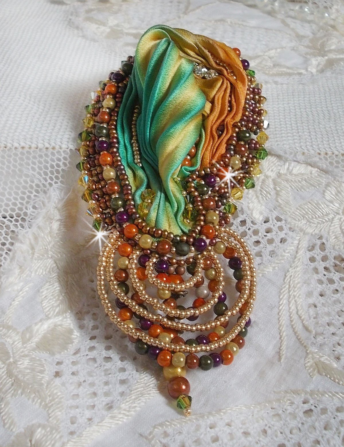 Venetian moon brooch embroidered with silk ribbon, magic beads and Swarovski crystals
