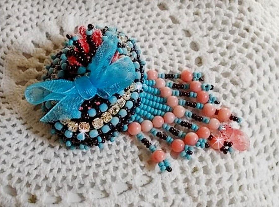 Naiad brooch embroidered with gemstone beads (Turquoise and Coral), crystals, cowhide and seed beads