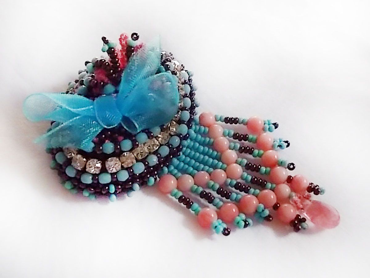 Naiad brooch embroidered with gemstone beads (Turquoise and Coral), crystals, cowhide and seed beads