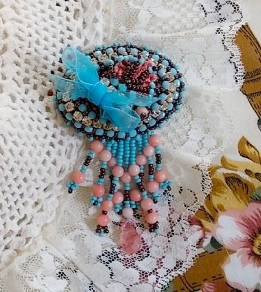 Naiad brooch embroidered with gemstone beads (Turquoise and Coral), crystals, cowhide and seed beads